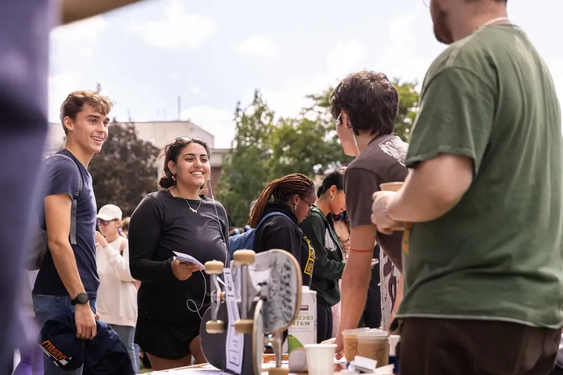 Students on campus at the student involvement fair.